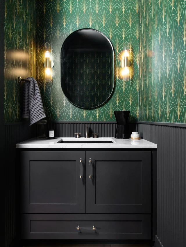 Powder rooms are the perfect place to go bold—and we did just that. 
In this new build by @vanguardhomes, we designed a powder bath that flirts with quiet luxury but isn’t afraid to turn up the drama. A deep green Art Deco wallpaper sets the tone—equal parts Great Gatsby and Southern charm—with glimmers of gold and patterned accents that feel equal parts timeless and daring. Think vintage cocktail party meets modern-day elegance.

This space may be small, but she’s a showstopper. 

Designed by RB Interiors
Built by: @vanguardcustomhomeshsv 
Photo: @kevinbrost 

#PowderBathGoals #QuietLuxury #ArtDecoDesign #the uildersdesigner#SouthernCharm #InteriorDesign #RachelBrownInteriors #BuilderDesignerCollab #DesignDetails #LuxuryNewBuild #BoldBathrooms #vanguardhomes